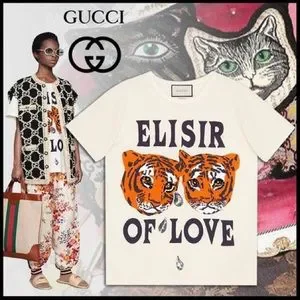 GUCCI トラプリント Tシャツ ELISIR OF LOVE GUCCI トラプリント Tシャツ ELISIR OF LOVE